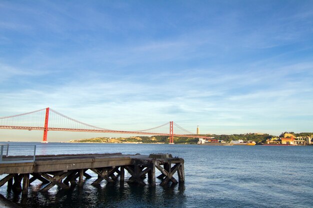 Premium Photo | View of the famous portuguese bridge over the tagus ...