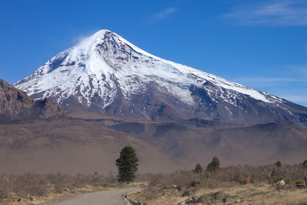 Premium Photo | View of the lanin volcano from the road to tromen lake ...