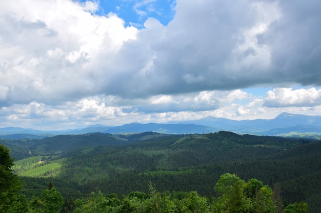 Premium Photo | View of the valley from the top of the mountain against ...