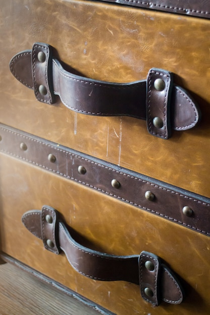 Premium Photo | Vintage brown leather suitcase up close