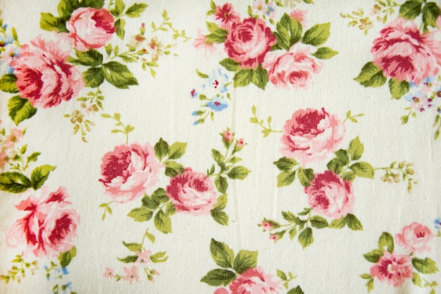 Premium Photo | Vintage rose pattern on fabric background.