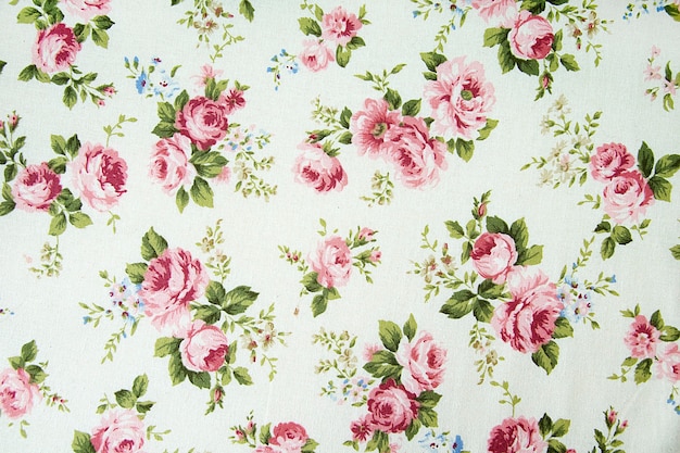 Premium Photo | Vintage rose pattern on fabric background.