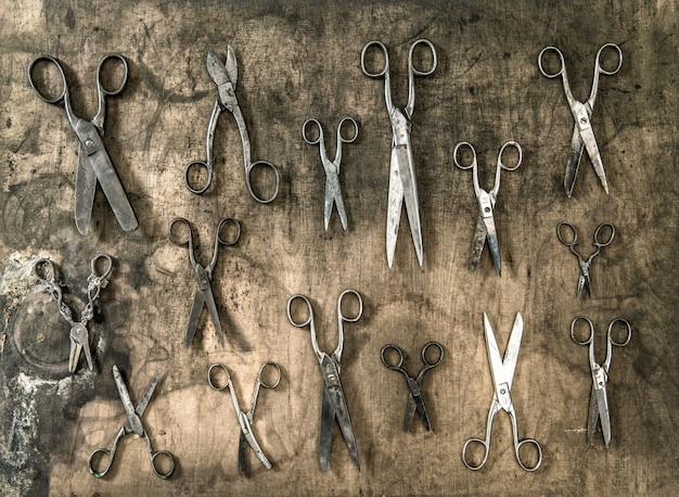 Premium Photo | Vintage scissors rustic wooden background