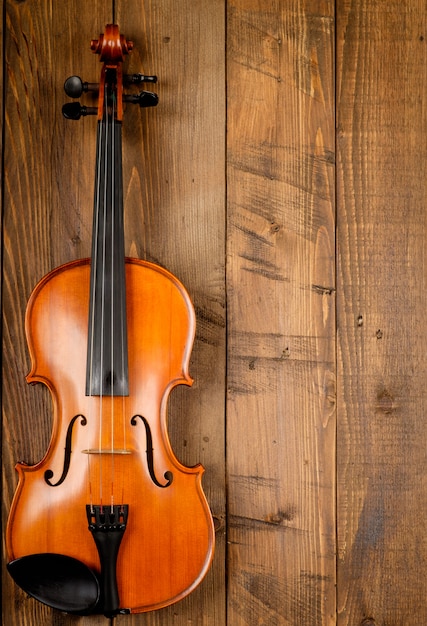 Premium Photo Violin In Wood 1421