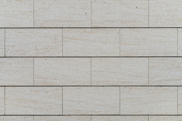 Premium Photo | Wall with big blocks of travertine marble