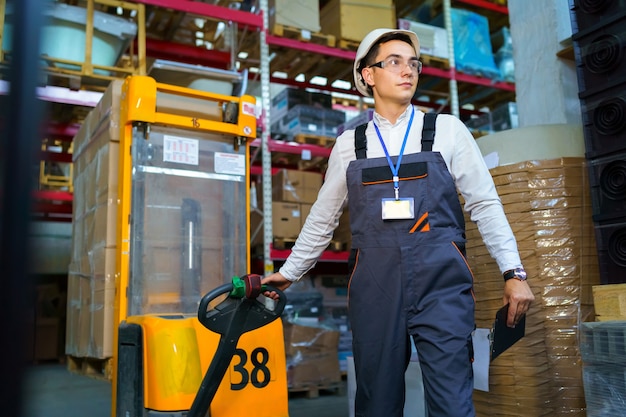 Premium Photo Warehouse Worker With Forklift