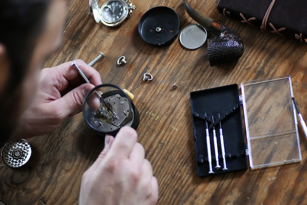 Premium Photo | Watch clock repair