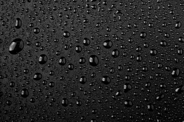 Premium Photo | Water droplets on black space