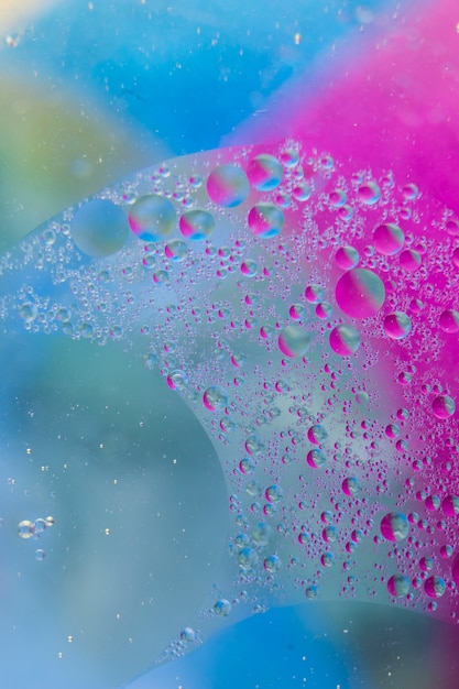 Free Photo | Water drops on the colorful glass surface