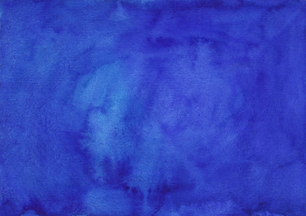 水彩の深いラピスブルー背景テクスチャ手描き 紙に水色の青紫の汚れ プレミアム写真