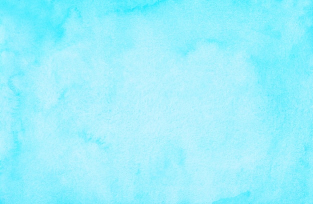 水彩パステルシアンブルーの背景の絵 水彩の明るいスカイブルーの汚れを紙に 芸術的なフレームの背景 プレミアム写真