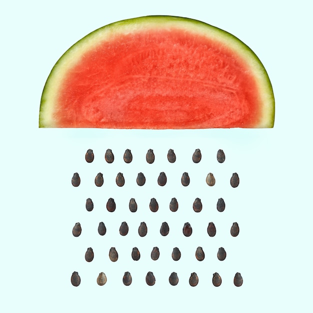  Watermelon slice with seeds raining Premium Photo