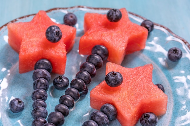 Premium Photo | Watermelon stars with blueberry stick