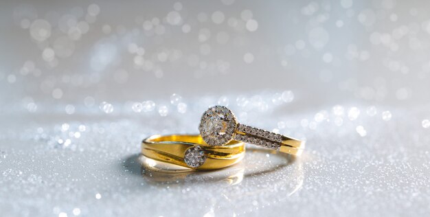 wedding-couple-diamond-rings-placed-white-ground-there-are-diamond-powder_74216-10.jpg (626×315)