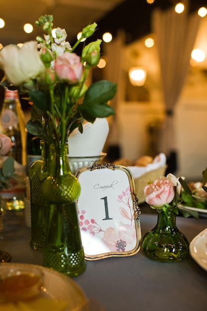 Wedding Dinner In The Restaurant Tables Decorated With Vases Of