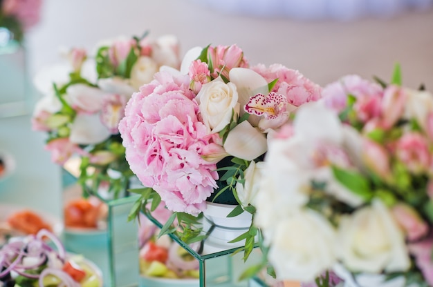 Wedding Dinner In The Restaurant Tables Decorated With Vases Of