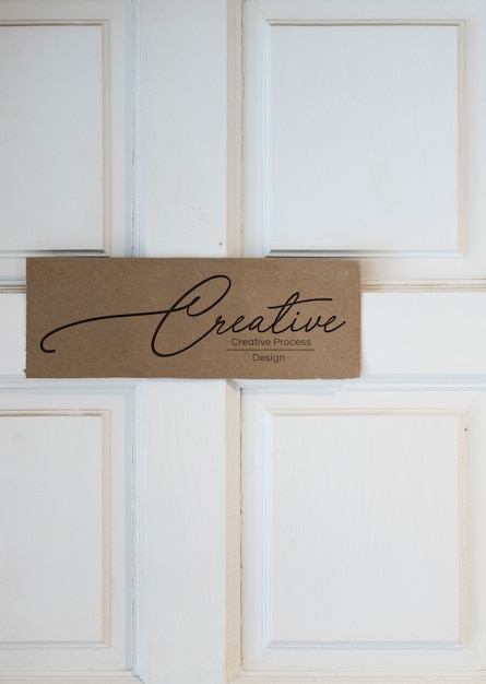 Download Welcome sign on a white door mockup | Premium Photo