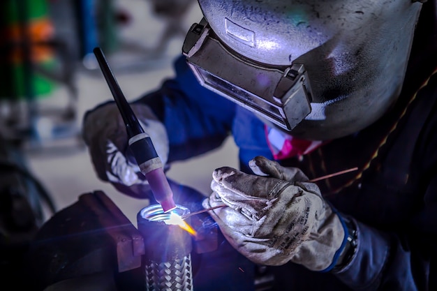 Welder is welding tungsten inert gas welding | Premium Photo