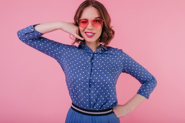 Free Photo | Well-dressed caucasian girl with short hair posing with ...