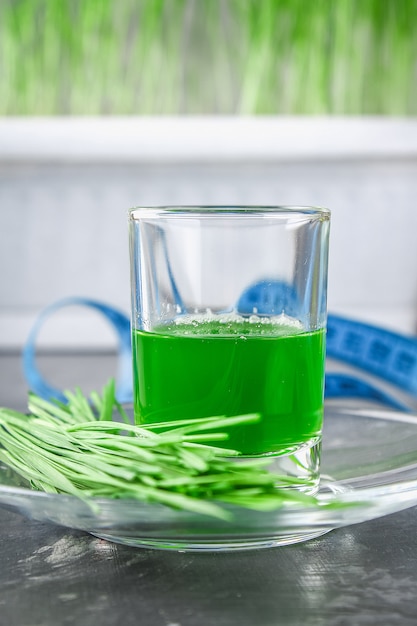 Premium Photo Wheatgrass Shot Juice From Wheat Grass Trend Of Health 7390