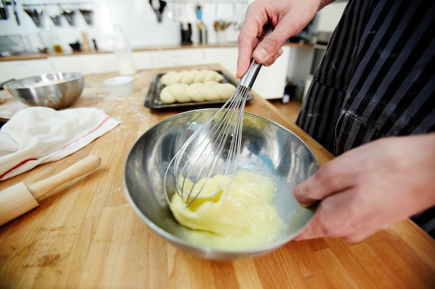 free-photo-whisking-at-the-kitchen