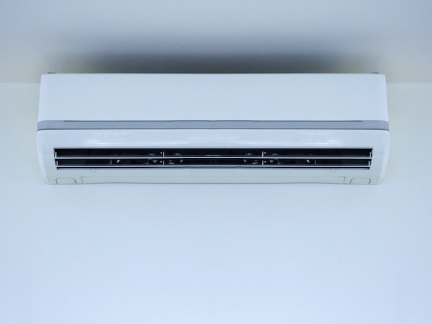 Premium Photo | White air conditioner on wall background