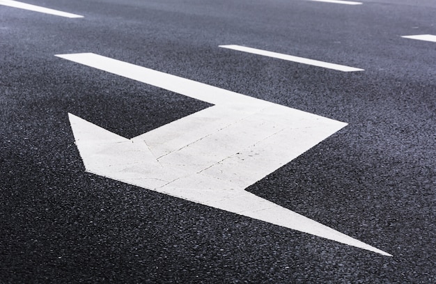 free-photo-white-arrow-on-the-road