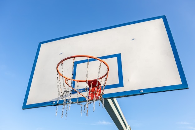 Premium Photo | White basketball hoop on a blue background