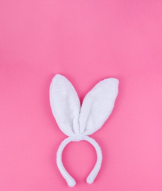 White Bunny Ears On Pink Background 