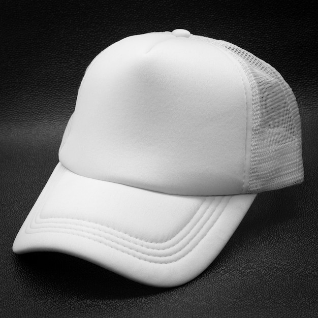 Download White cap on dark background. fashion hat for design. | Premium Photo