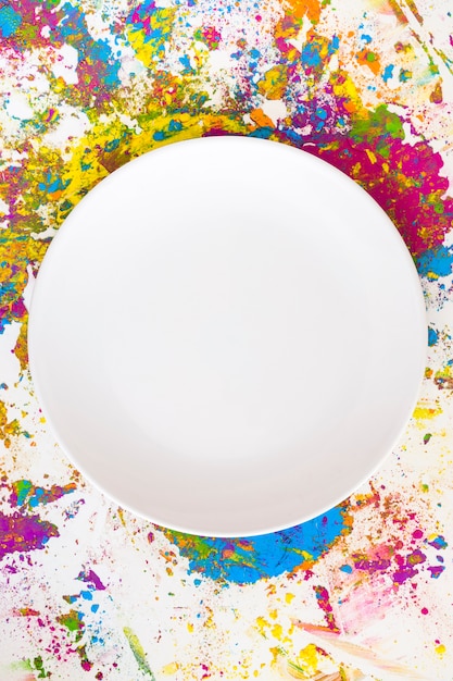 Free Photo | White circle on blurs of different bright dry colors