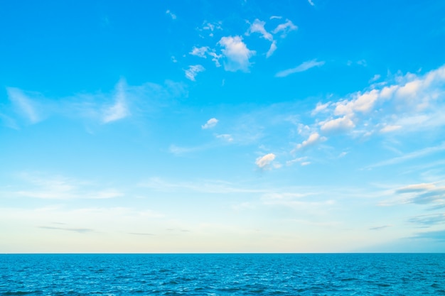 Premium Photo | White cloud on blue sky with sea and ocean