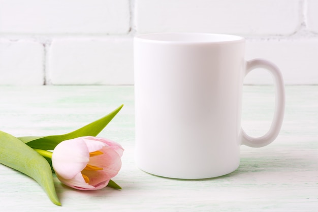 Download White coffee mug mockup with pink tulip | Premium Photo