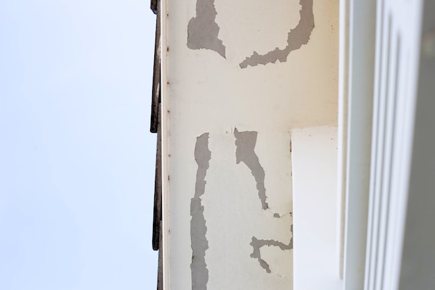 Premium Photo | White color paint peeling off on ceiling house. under ...