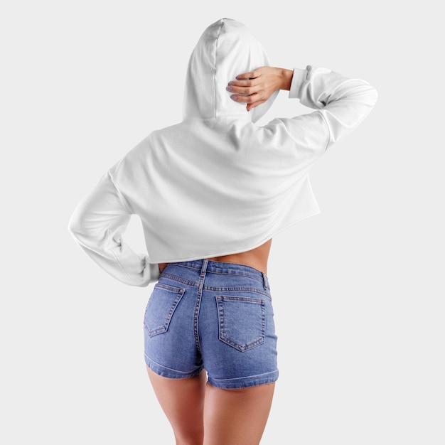 Premium Photo | White crop top hoodie on a young beautiful girl in blue ...