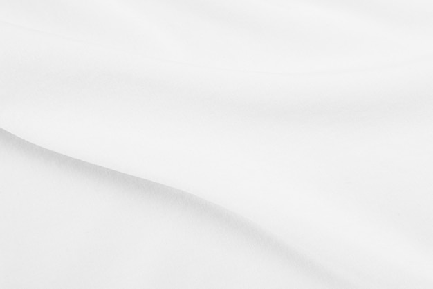 Premium Photo | White fabric texture background with soft waves.