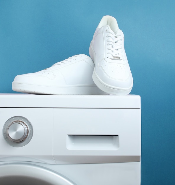 white sneakers in washing machine