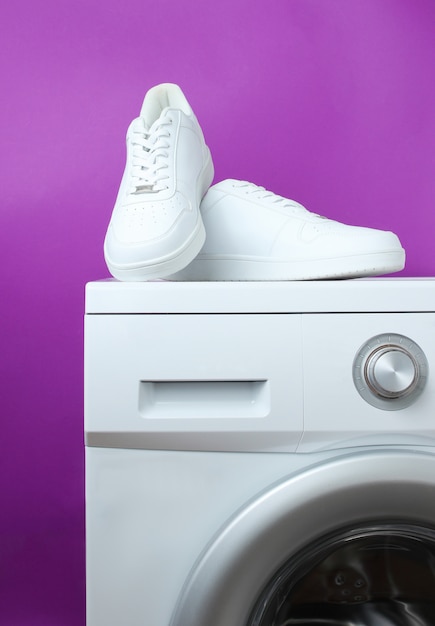 white sneakers in washing machine