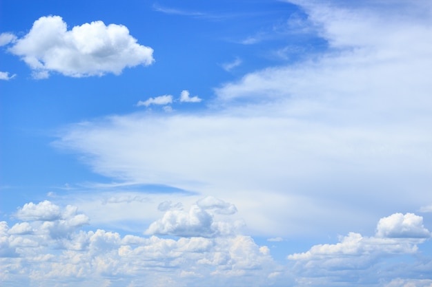 Premium Photo | White fluffy cumulus clouds, blue sky