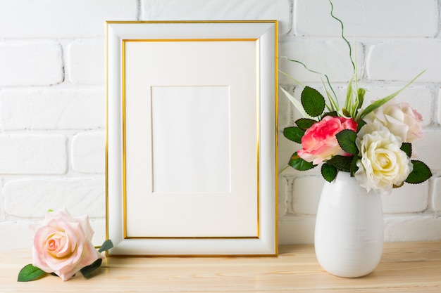 Download White frame mockup on brick wall with roses | Premium Photo