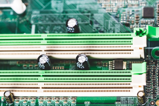 Free Photo | White and green memory slot in computer motherboard