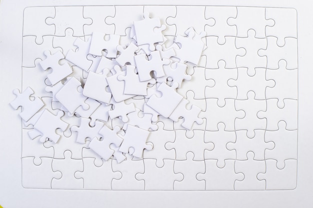 Premium Photo | White jigsaw puzzle pieces