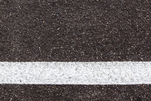 Premium Photo | White line on asphalt road texture background