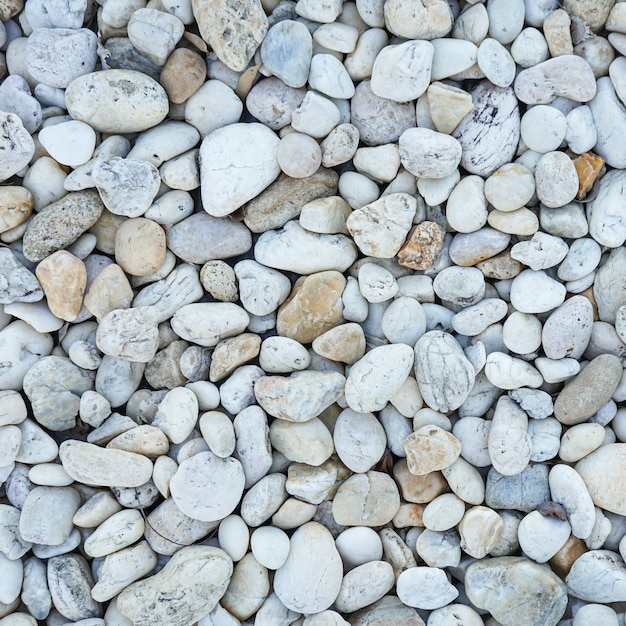 Premium Photo | White pebbles stone texture and background