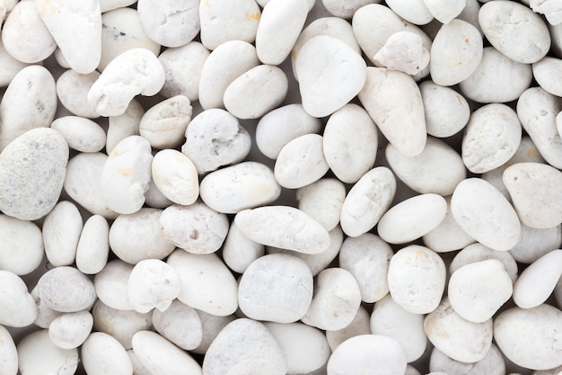 Premium Photo | White pebbles stone texture and background