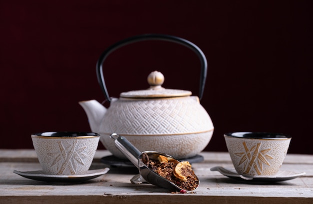 White Porcelain Teapot And Two Glasses To Serve The Tea With Spice Palin Premium Photo