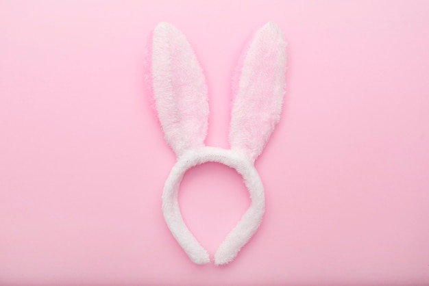 Premium Photo | White rabbit ears on pink background, easter minimal ...