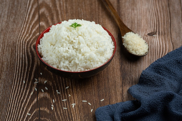 Free Photo White Rice Is Placed In A Cup On The Wooden Floor