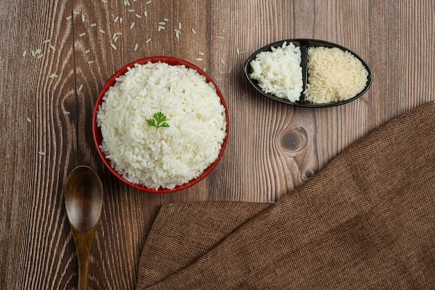 Free Photo White Rice Is Placed In A Cup On The Wooden Floor