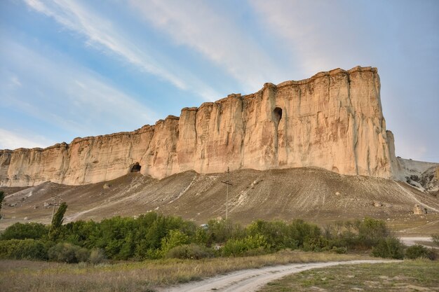 Premium Photo | White rock in summer against the sky